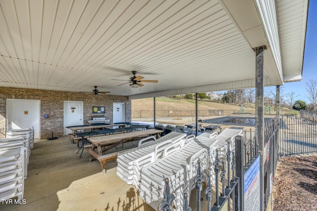 view of patio / terrace featuring ceiling fan