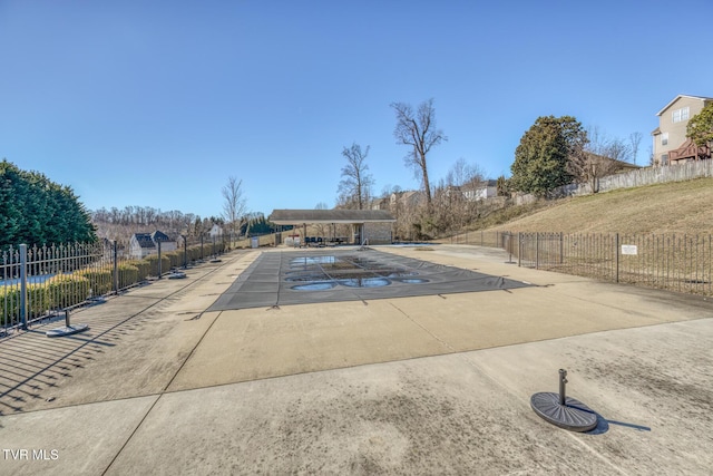 view of swimming pool featuring a patio