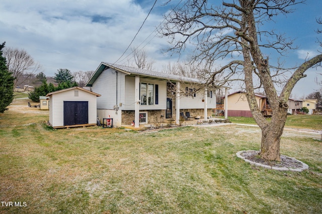 split foyer home featuring a shed and a front yard