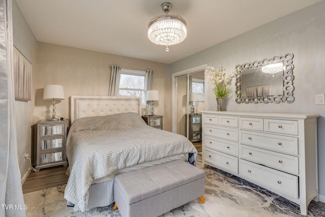 bedroom featuring a chandelier