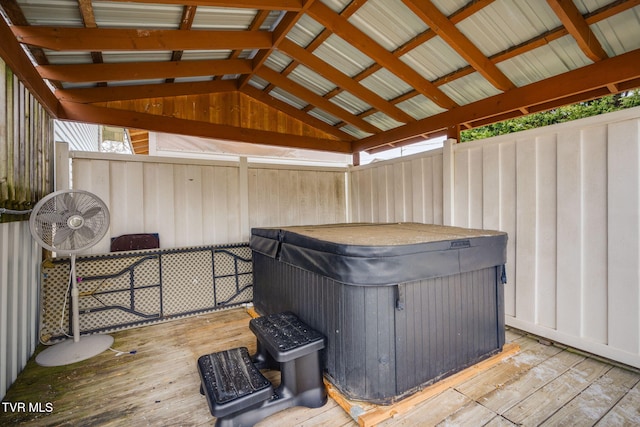 exterior space featuring a gazebo and a hot tub