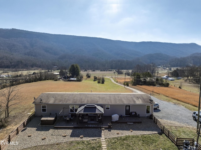 view of mountain feature with a rural view