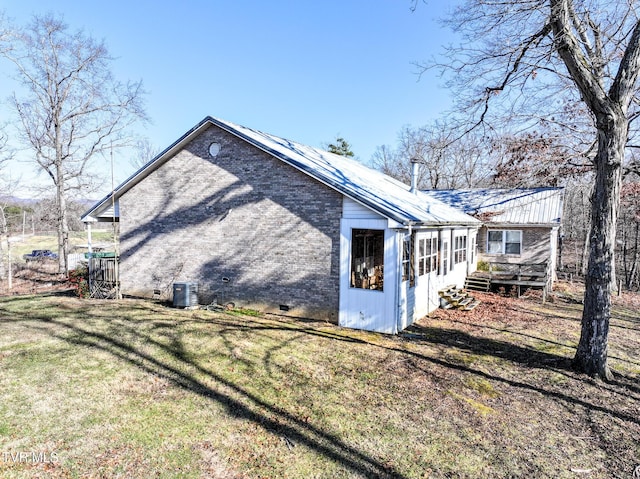 view of property exterior featuring a yard and cooling unit