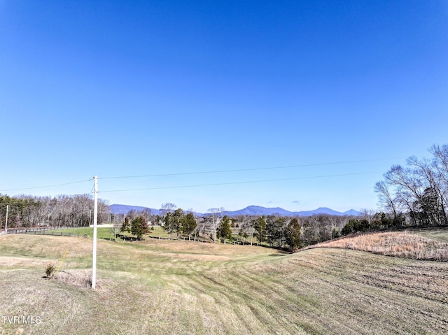 property view of mountains with a rural view