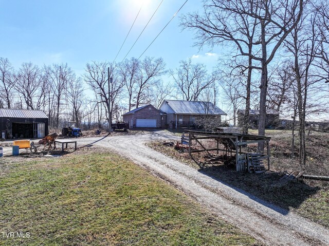 view of yard featuring a garage