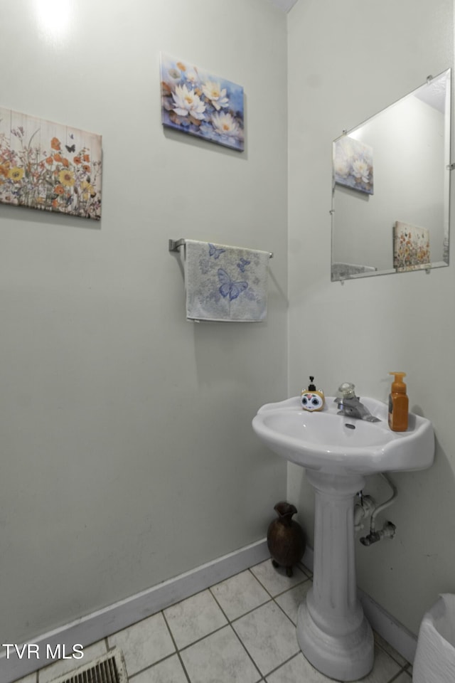 bathroom with tile patterned flooring