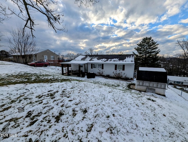 view of snow covered property