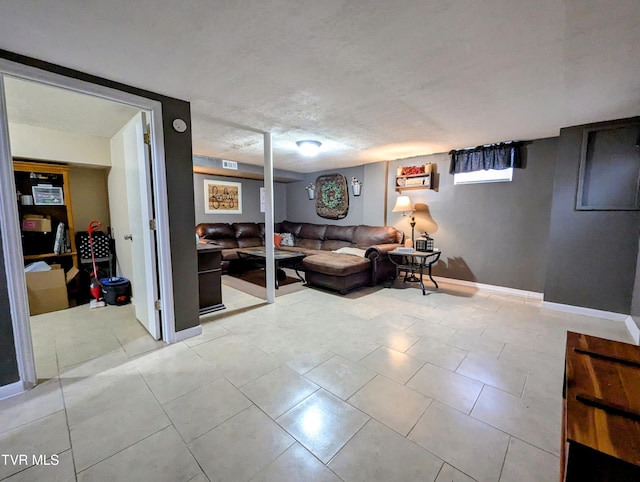 living room with a textured ceiling