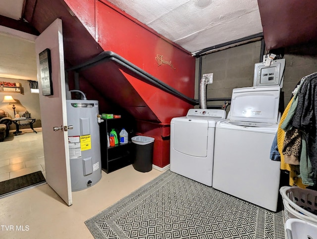 laundry room featuring water heater and independent washer and dryer