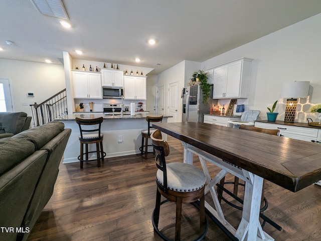 interior space with dark wood-type flooring