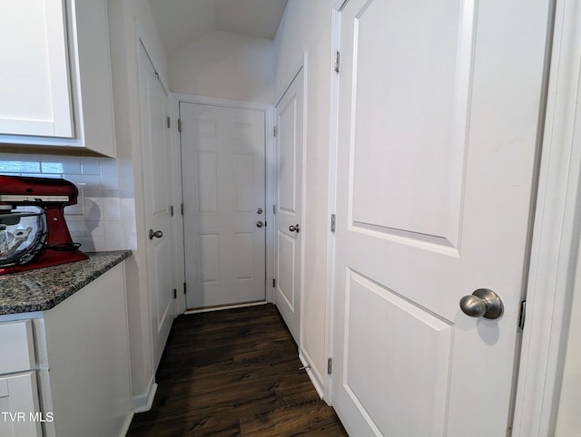 hall featuring dark wood-type flooring