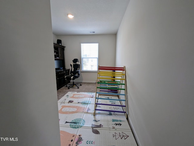 bedroom with light carpet