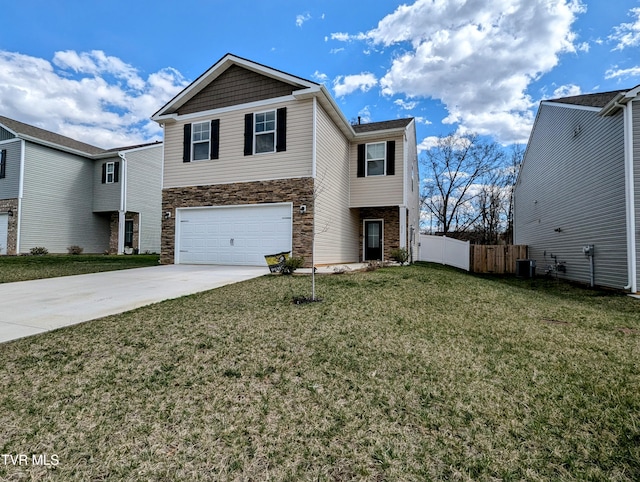 view of front facade featuring concrete driveway, fence, an attached garage, stone siding, and a front lawn
