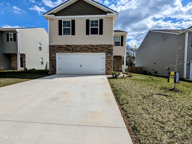 view of front facade featuring stone siding, an attached garage, a front yard, and driveway