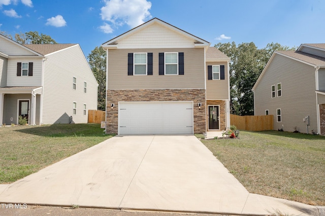 view of front of property featuring a garage and a front yard