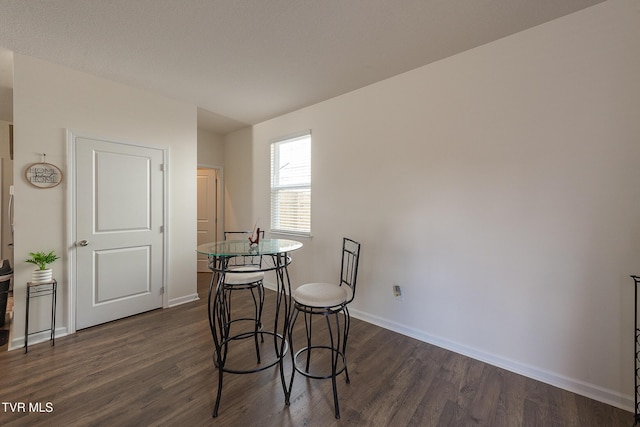 dining room featuring dark hardwood / wood-style floors