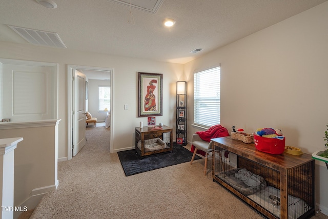 interior space featuring a textured ceiling