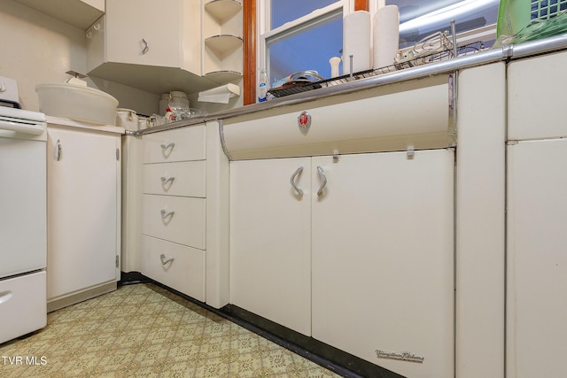 interior space with white cabinets