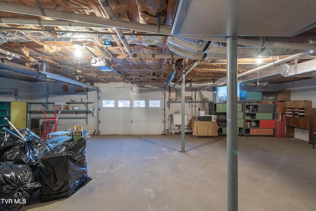 garage with sink and a garage door opener