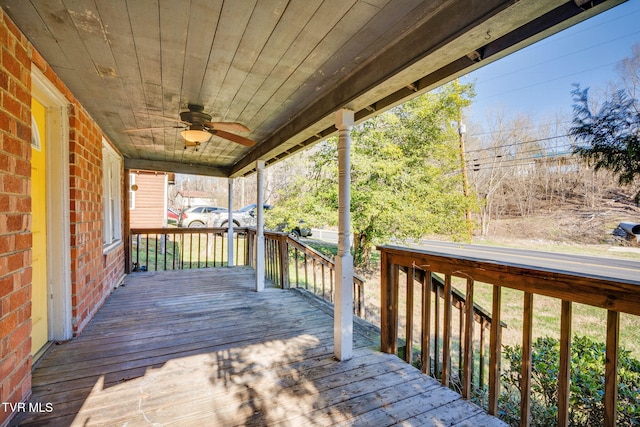 deck featuring ceiling fan and a porch