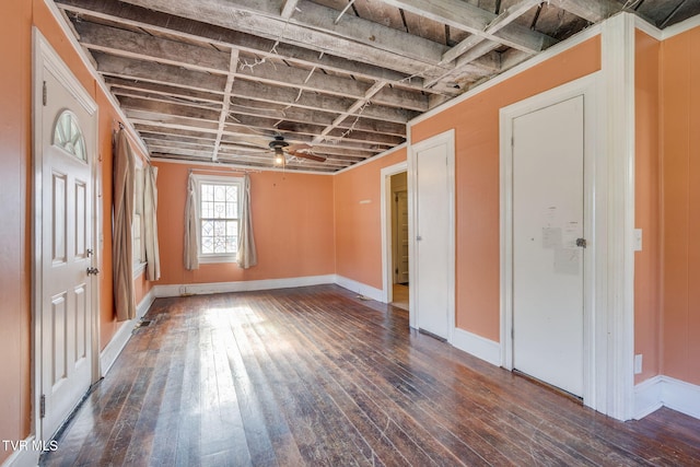 interior space with dark hardwood / wood-style floors