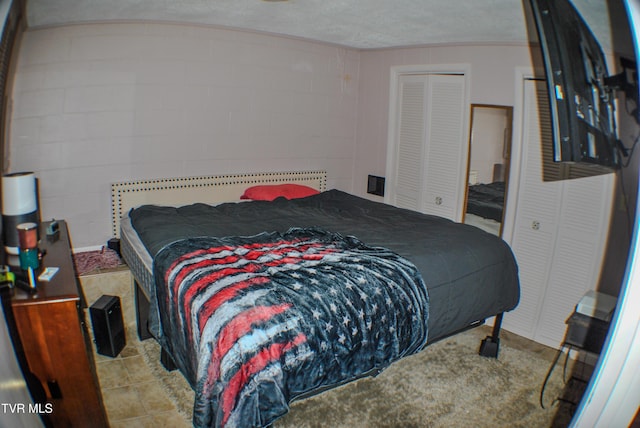 bedroom featuring a textured ceiling