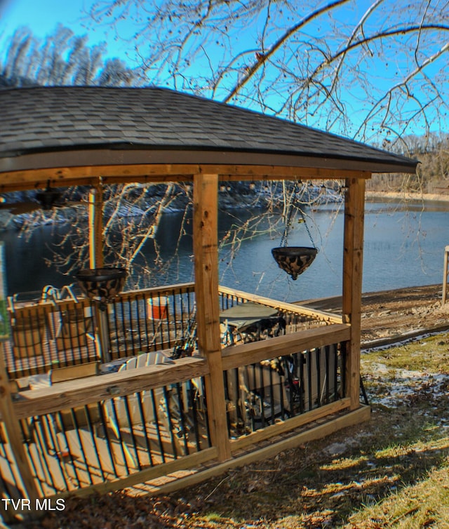 deck featuring a water view