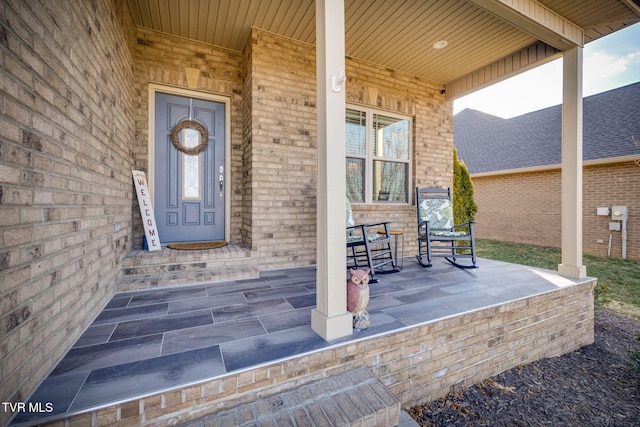 entrance to property with covered porch