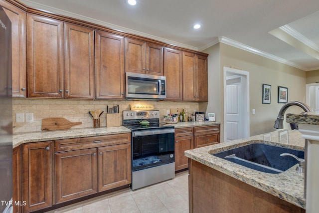 kitchen with sink, light tile patterned floors, crown molding, stainless steel appliances, and light stone counters