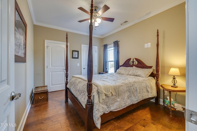 bedroom featuring ceiling fan, ornamental molding, and dark hardwood / wood-style flooring