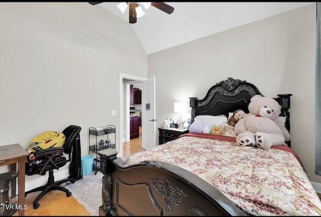 bedroom with ceiling fan, light wood-type flooring, and high vaulted ceiling