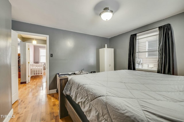 bedroom featuring light hardwood / wood-style floors