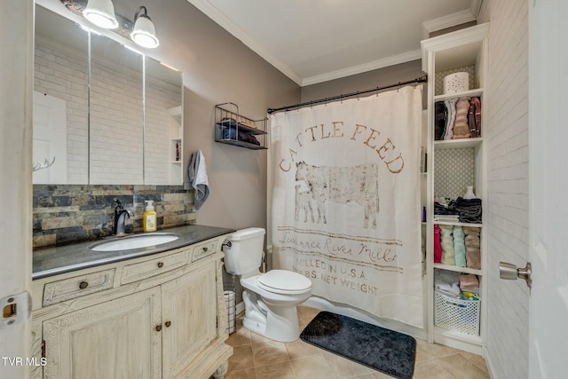 bathroom with tile patterned flooring, vanity, ornamental molding, and tasteful backsplash