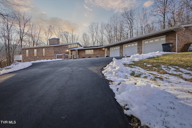 view of front of home with a garage