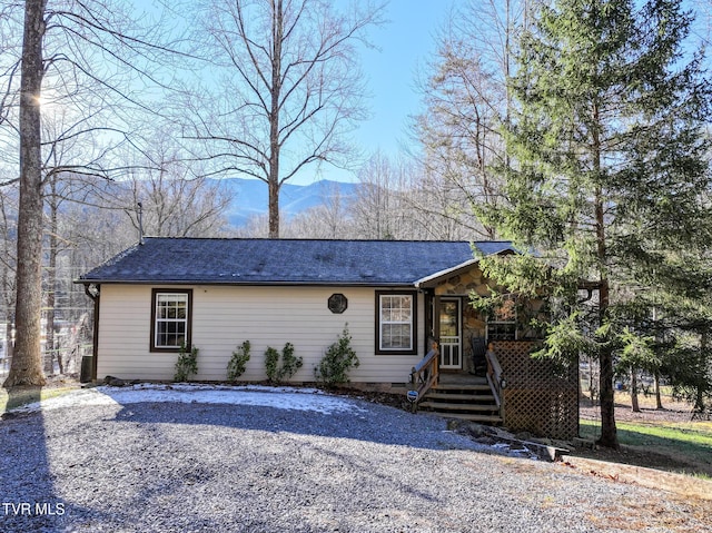 single story home with a mountain view