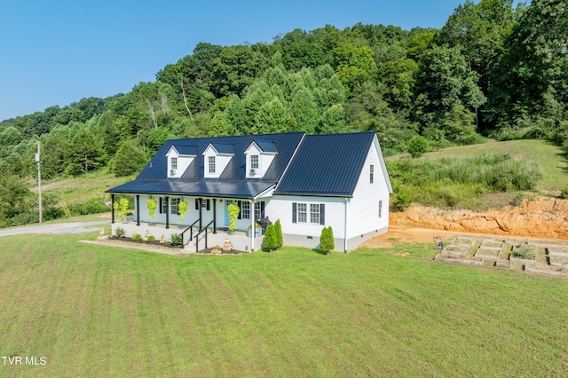 cape cod-style house with a porch and a front lawn