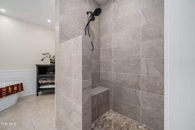 bathroom featuring tiled shower