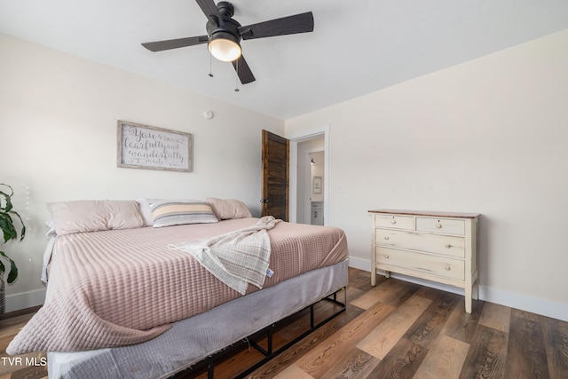 bedroom featuring ceiling fan and dark wood-type flooring