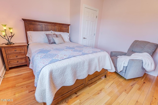 bedroom with light hardwood / wood-style flooring