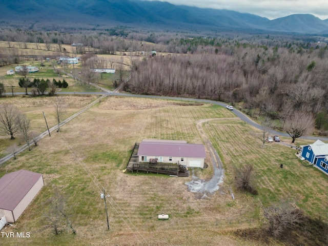 bird's eye view featuring a mountain view and a rural view