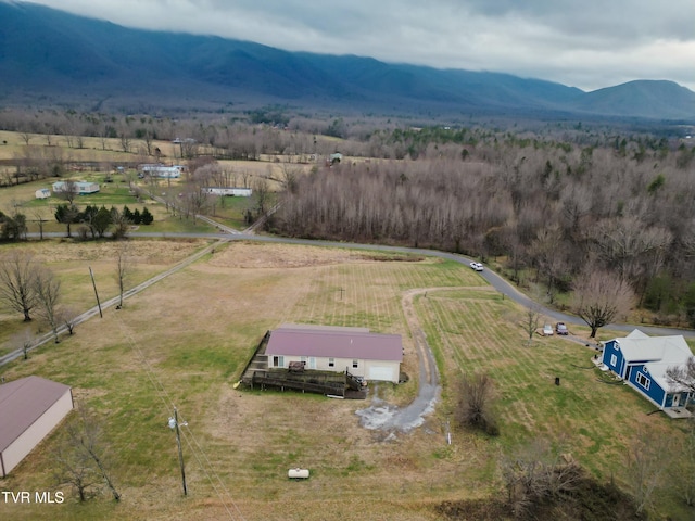 bird's eye view with a mountain view and a rural view