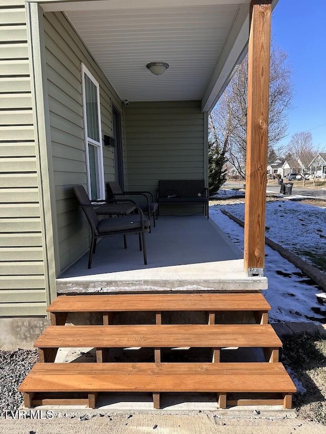 wooden terrace featuring a porch