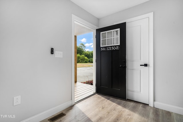 entrance foyer with light hardwood / wood-style floors