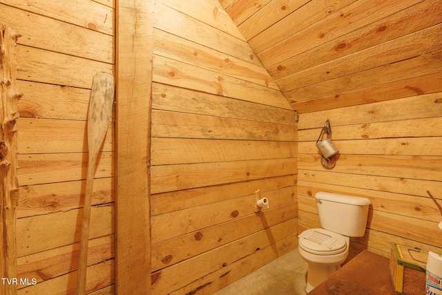 bathroom featuring toilet, lofted ceiling, and wood ceiling