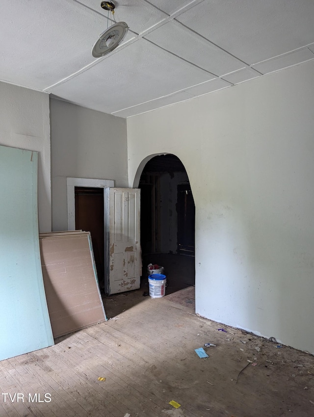 unfurnished bedroom with wood-type flooring