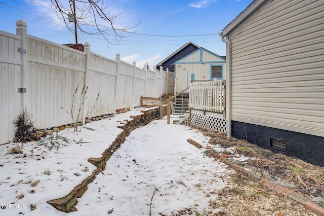 view of yard featuring a deck and fence