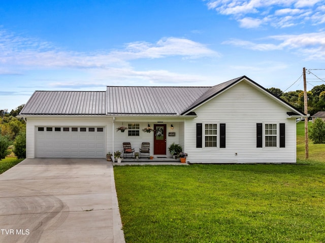 single story home with a porch, a garage, and a front lawn