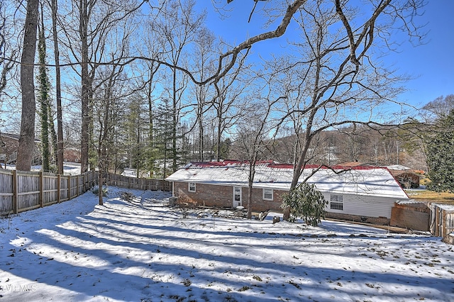 view of snowy yard