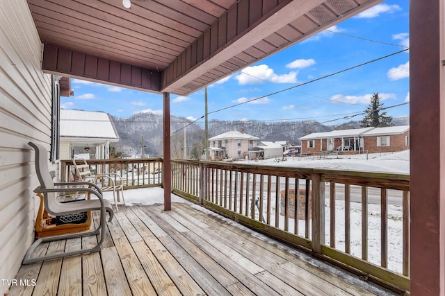 view of snow covered deck