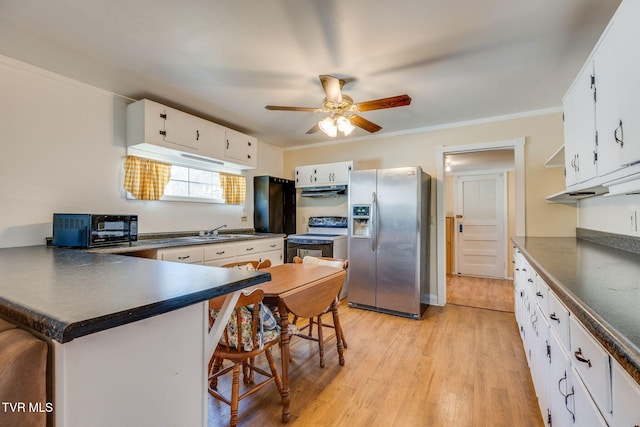 kitchen with a peninsula, electric stove, light wood-type flooring, stainless steel refrigerator with ice dispenser, and dark countertops